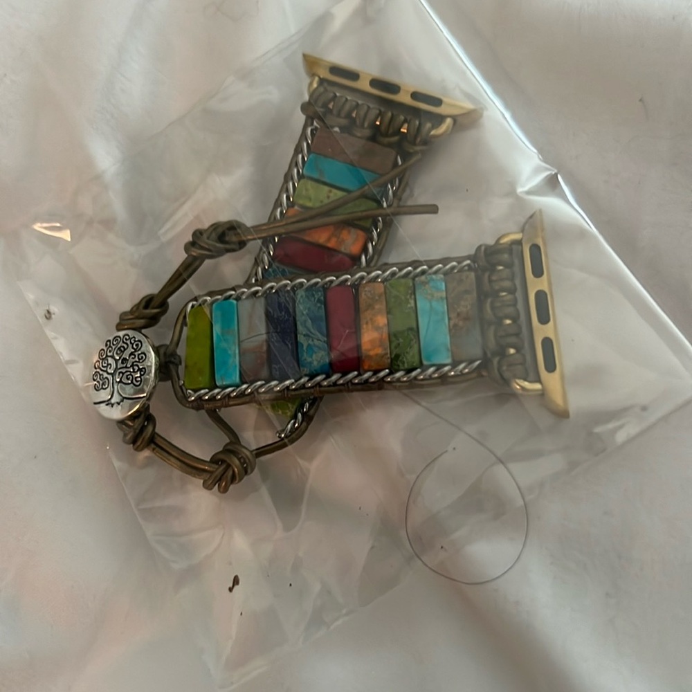New in package iwatch band. Multiple beaded colors.